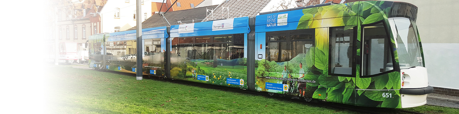 Straßenbahn-Beklebung